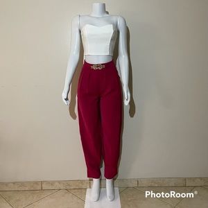 Red pleated tapered high waisted pants